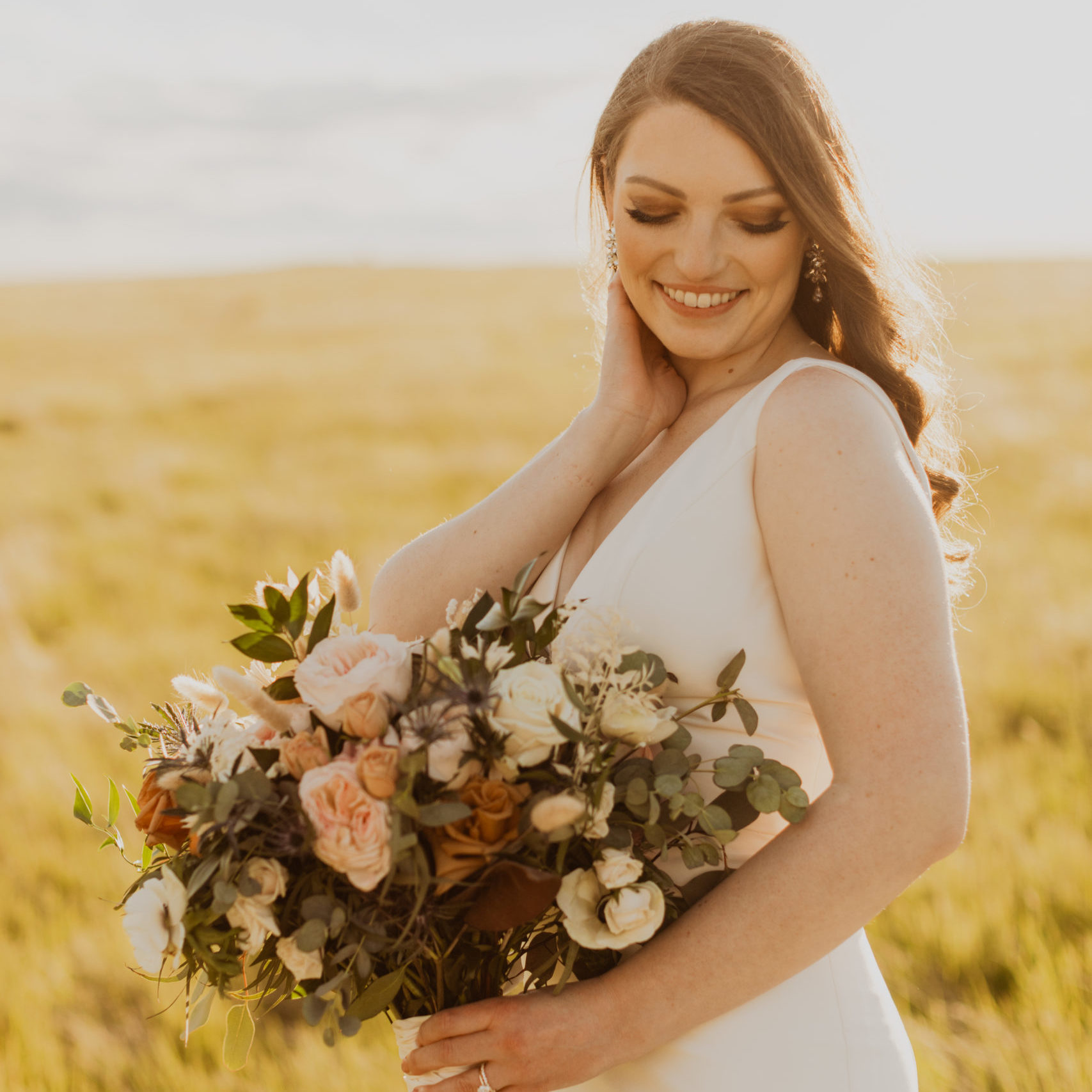 Katie holding her wedding flower bouquet