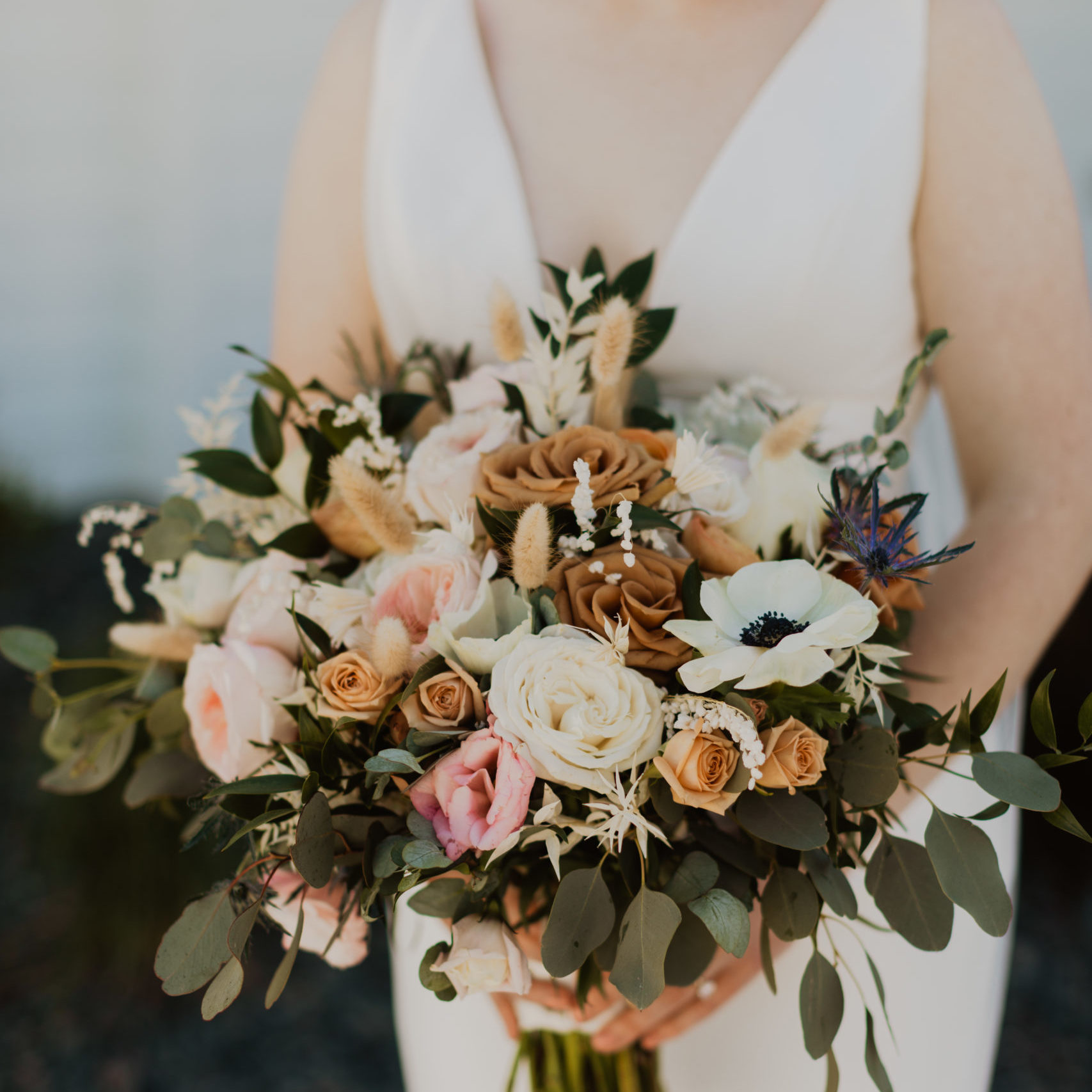Katie holding her wedding flower bouquet